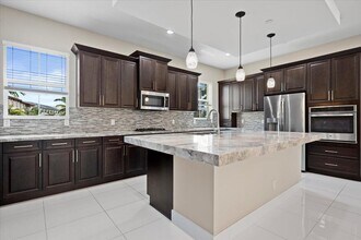 7114 Edison Pl in Palm Beach Gardens, FL - Building Photo - Building Photo