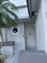 7700 Stone Harbour Dr in Greenacres, FL - Building Photo - Building Photo