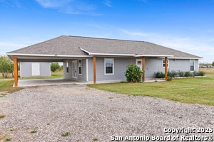 1034 Co Rd 6710 in Natalia, TX - Building Photo