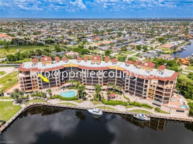 5702 Cape Harbour Dr in Cape Coral, FL - Building Photo - Building Photo