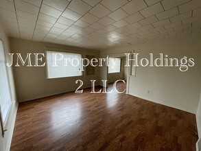 113 W Young St, Unit #1 Main Floor Unit in Clio, MI - Foto de edificio - Building Photo