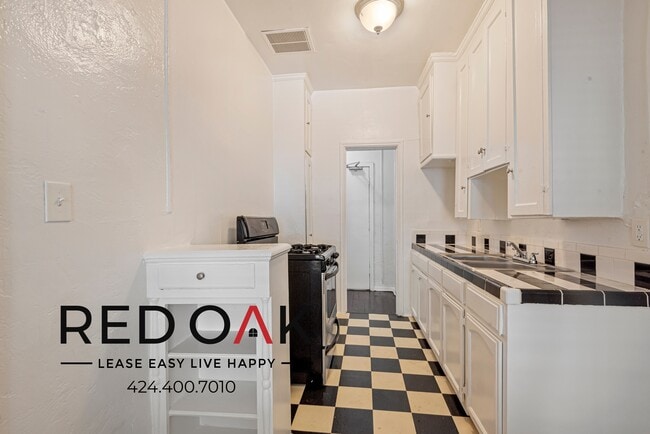 849 S Oxford Ave, Unit 102 in Los Angeles, CA - Foto de edificio - Building Photo