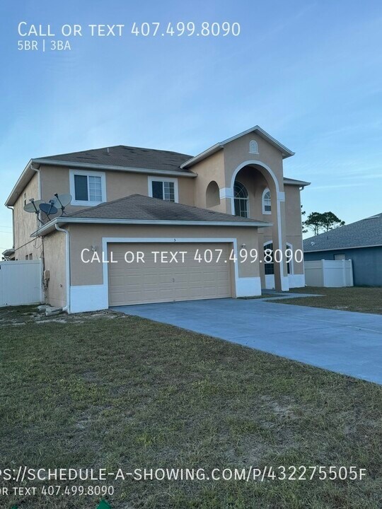 5 Sawfish Dr in Poinciana, FL - Building Photo