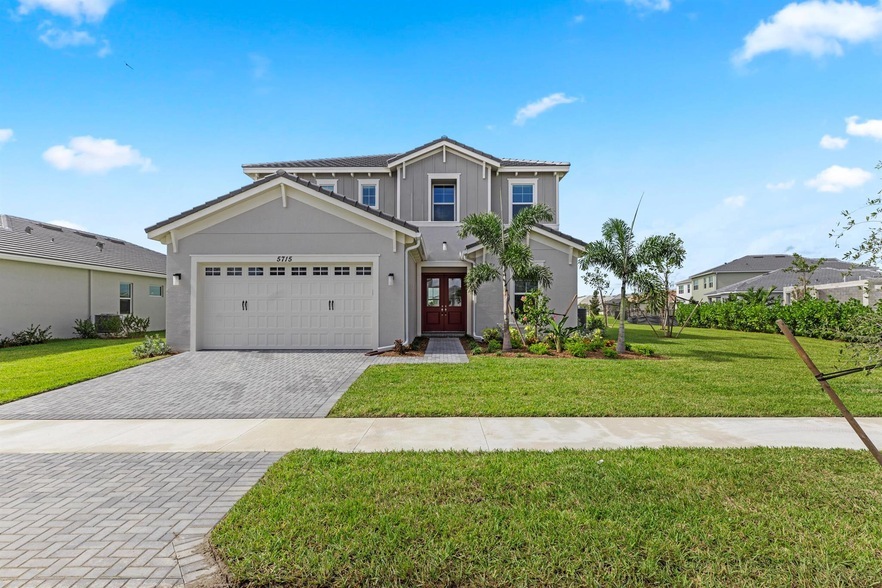 5715 Bristlecone Cmns, Unit 3756-814 in Loxahatchee, FL - Foto de edificio