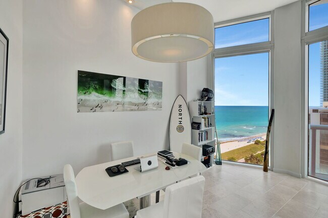 property at 6515 Collins Ave