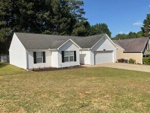 512 Waltham Ln in Sugar Hill, GA - Building Photo - Building Photo