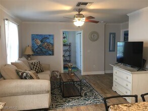 4404 Lake Heather Cir in Saint James City, FL - Building Photo - Building Photo