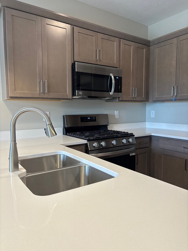 Ventura Townhomes in West Olive, MI - Foto de edificio - Building Photo