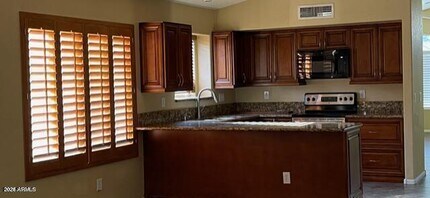 15820 W Latham St in Goodyear, AZ - Building Photo - Building Photo