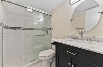 100 Village Green Cir E in Palm Springs, FL - Building Photo - Building Photo