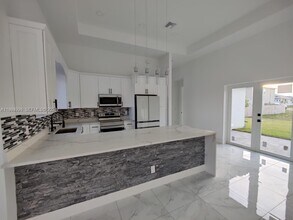 716 NW 37th Ave in Cape Coral, FL - Building Photo - Building Photo