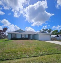 1410 SW Flounder Ln in Port St. Lucie, FL - Building Photo