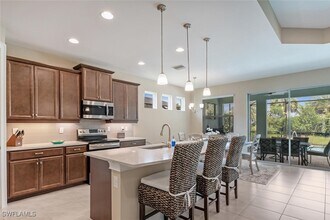 14586 Tropical Dr in Naples, FL - Building Photo - Building Photo