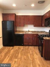 6102 Bellinham Ct, Unit 911 in Baltimore, MD - Building Photo - Building Photo
