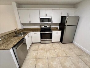 10131 W Sunrise Blvd, Unit 203 in Plantation, FL - Building Photo - Building Photo