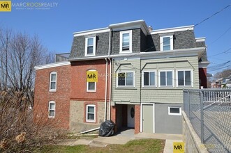 184 Gladstone St, Unit 1 in Boston, MA - Foto de edificio - Building Photo