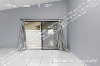 3331 Whispering Dr N in Largo, FL - Building Photo - Building Photo