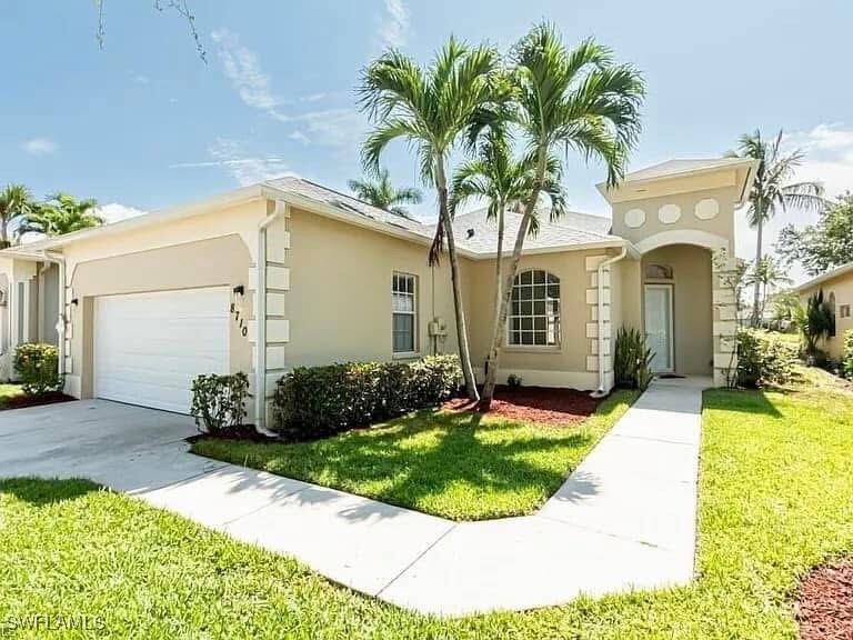 8710 Ibis Cove Cir in Naples, FL - Foto de edificio