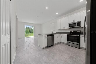 7708 Stone Crk Trl in Kissimmee, FL - Building Photo - Building Photo