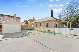 1445 S Rebecca St in Pomona, CA - Foto de edificio - Building Photo