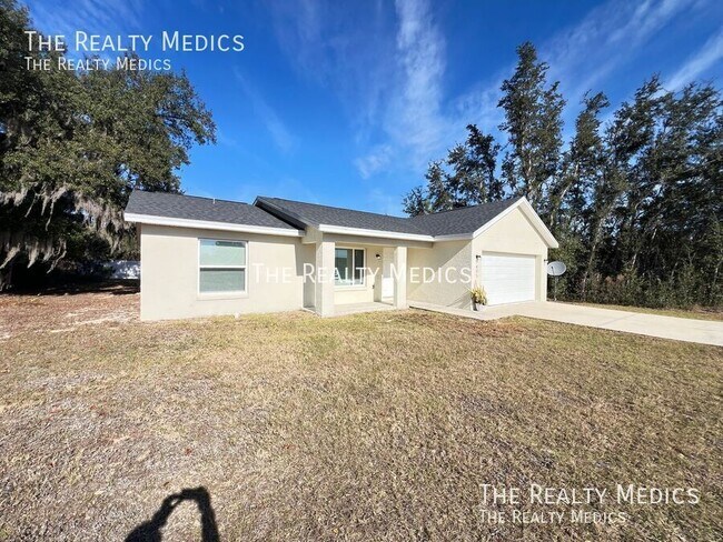 405 Malauka Loop in Ocklawaha, FL - Building Photo - Building Photo