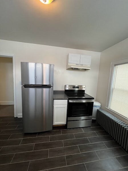 164 Wall St, Unit 101 in Corning, NY - Foto de edificio - Building Photo