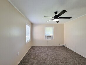 1107 Milam St in Liberty, TX - Building Photo - Building Photo