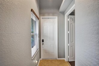 2057 SE Avon Park Dr in Port St. Lucie, FL - Building Photo - Building Photo