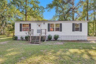 13890 Old Texaco Camp Rd in Conroe, TX - Building Photo - Building Photo