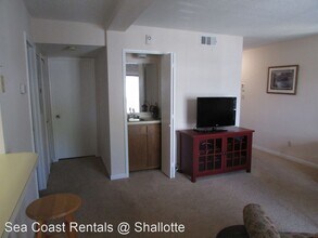 10174 Beach Dr SW-Unit -1 301 in Calabash, NC - Building Photo - Building Photo