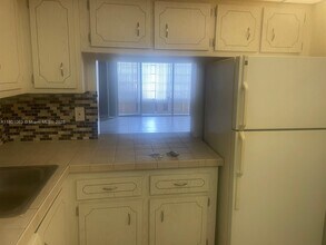 8311 Sands Point Blvd, Unit 105 in Tamarac, FL - Building Photo - Building Photo