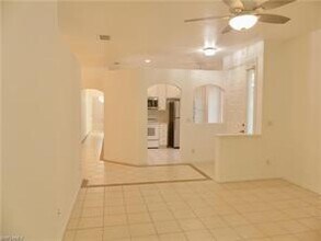 7550 Meadow Lakes Dr-Unit -1 in Naples, FL - Building Photo - Building Photo