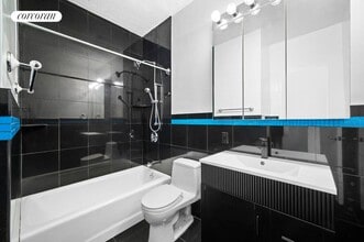 60 E 8th St in New York, NY - Foto de edificio - Building Photo