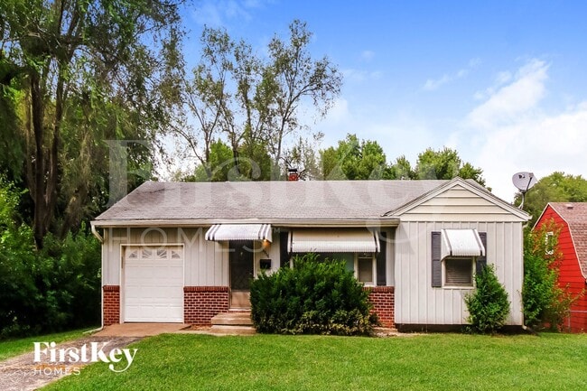 property at 9936 E 36th St S