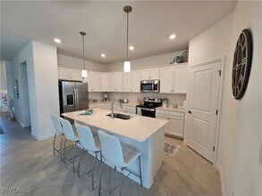 2437 Orchard St, Unit 2707 in Naples, FL - Building Photo - Building Photo