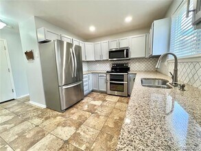 4927 Tarcoola Ln in Littleton, CO - Building Photo - Building Photo