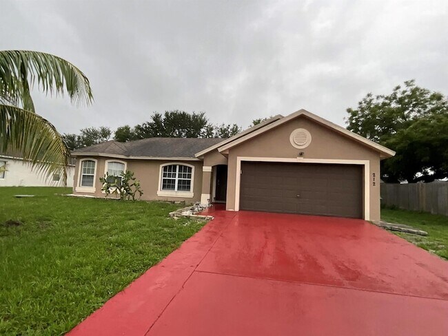 property at 212 SW Yager Pl