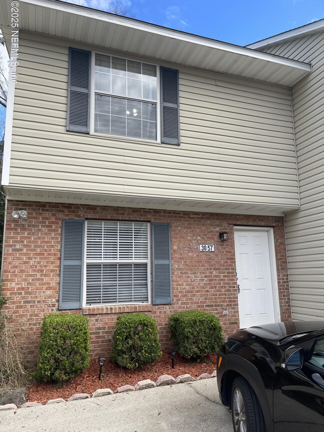 property at 3057 Camelliawood Cir E