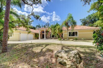 9033 Winding Woods Dr in Wellington, FL - Building Photo - Building Photo