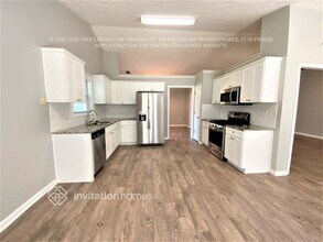 5842 Sycamore Ridge Dr in Sugar Hill, GA - Foto de edificio - Building Photo