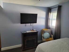 320 Clayton St in Central Islip, NY - Building Photo - Building Photo
