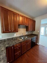 8161 Creekside Village Dr in Mechanicsville, VA - Building Photo - Building Photo