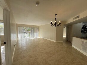 9033 Wiles Rd in Coral Springs, FL - Building Photo - Building Photo