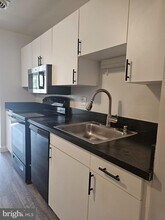 11315 Commonwealth Dr-Unit -202 in Rockville, MD - Building Photo - Building Photo