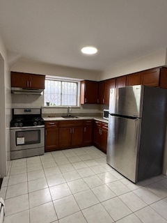 8708 101st Ave, Unit 2 FL in Ozone Park, NY - Building Photo