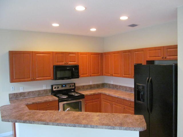 971 Tortuga Dr in Riviera Beach, FL - Building Photo - Building Photo