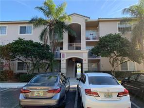 5035 Wiles Rd in Coconut Creek, FL - Building Photo