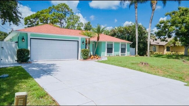 property at 2024 SW Monterrey Ln