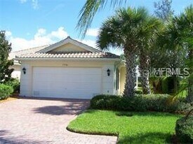 7715 Pesaro Dr in Sarasota, FL - Building Photo