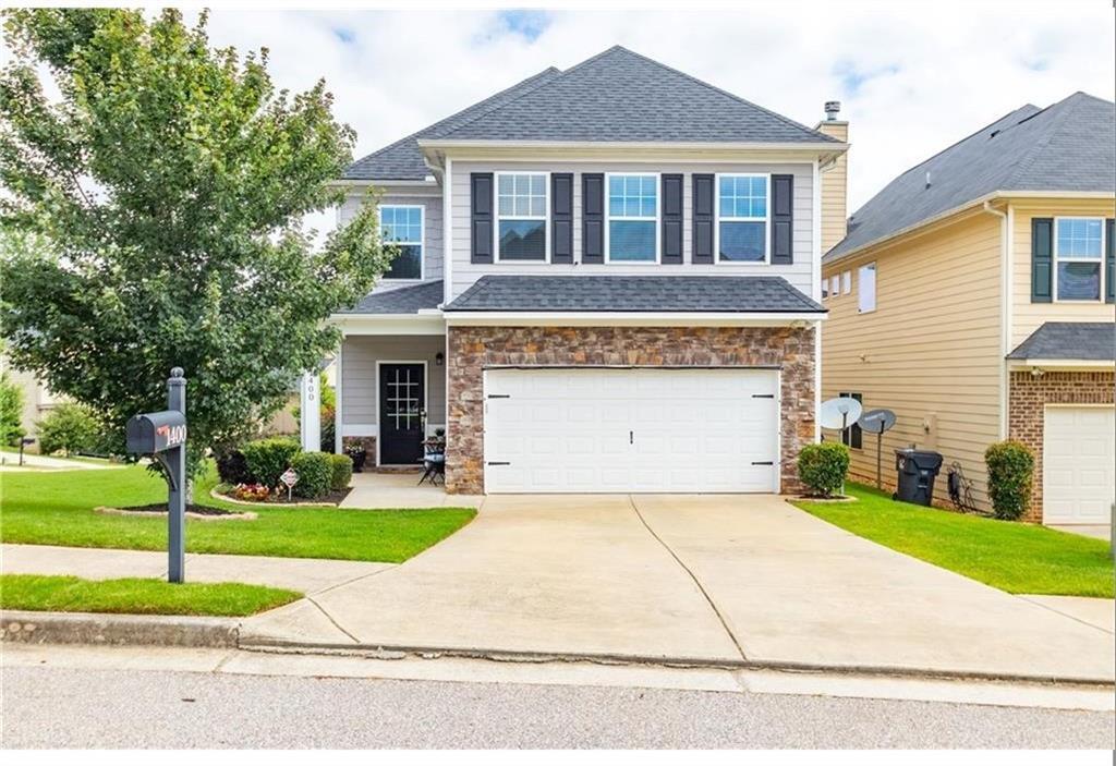 1400 Woodward Down Ct in Buford, GA - Building Photo